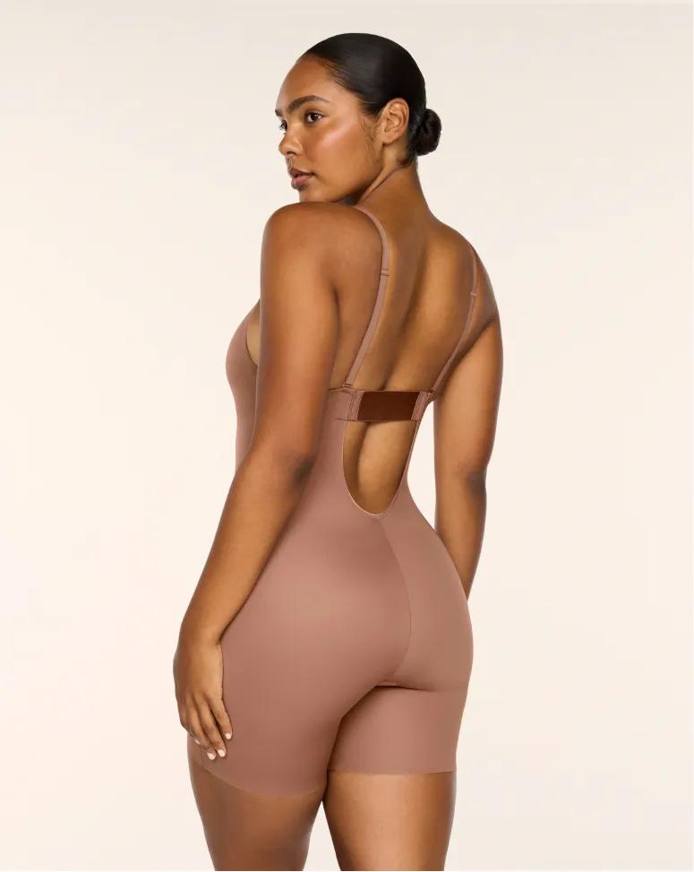 model from the back wearing brown shapewear