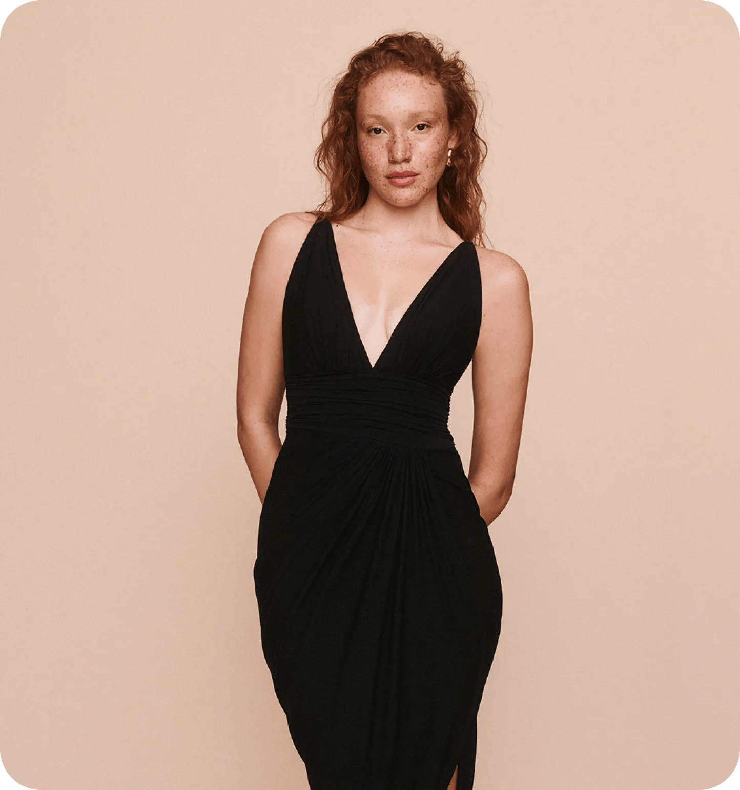 woman wearing plunging black dress