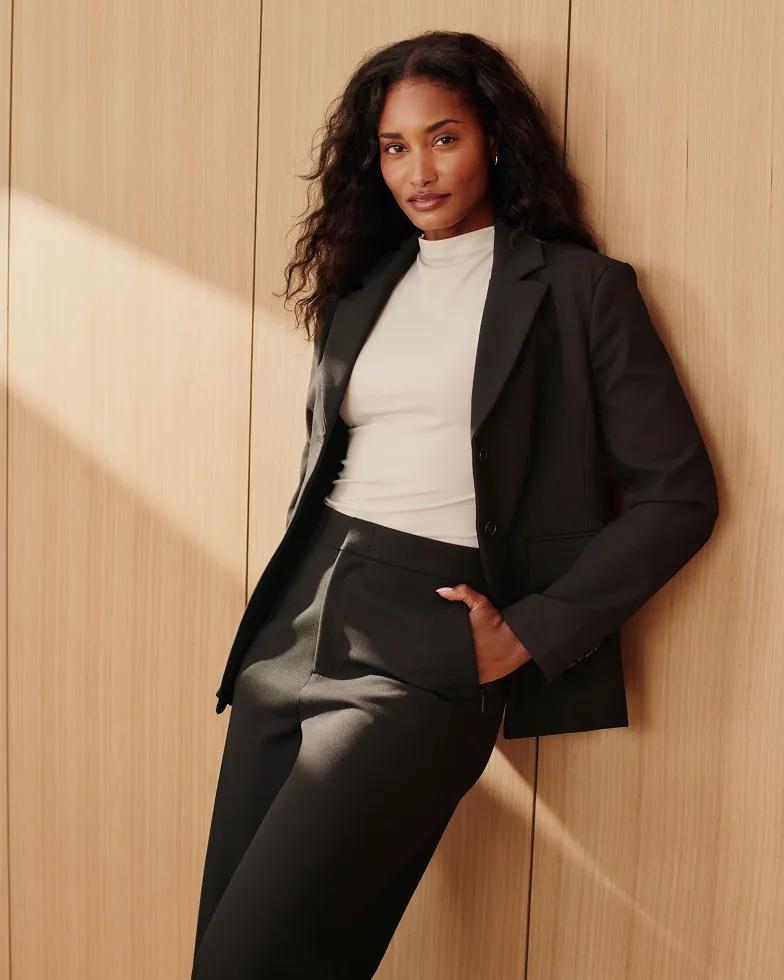 model in Wellsuited blazer