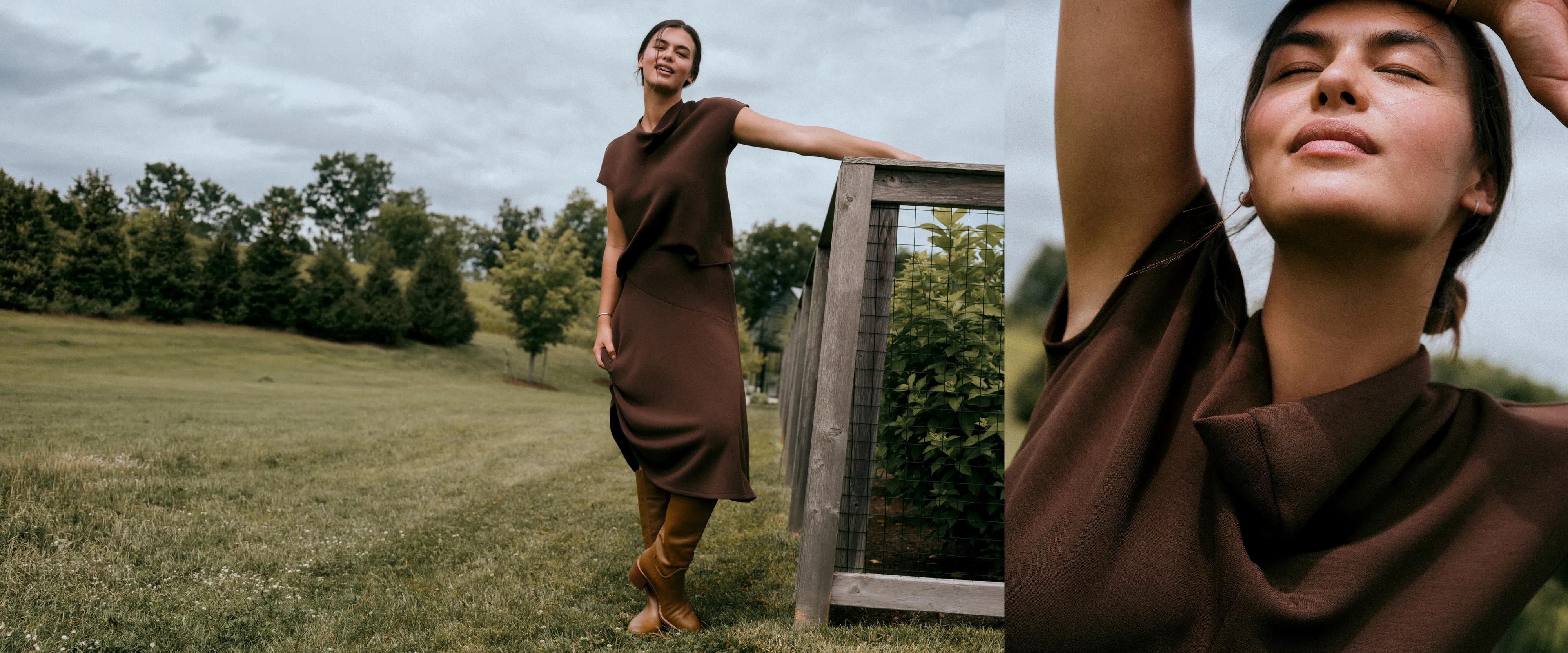 woman leaning on fence in brown airessentials draped top and skirt set
