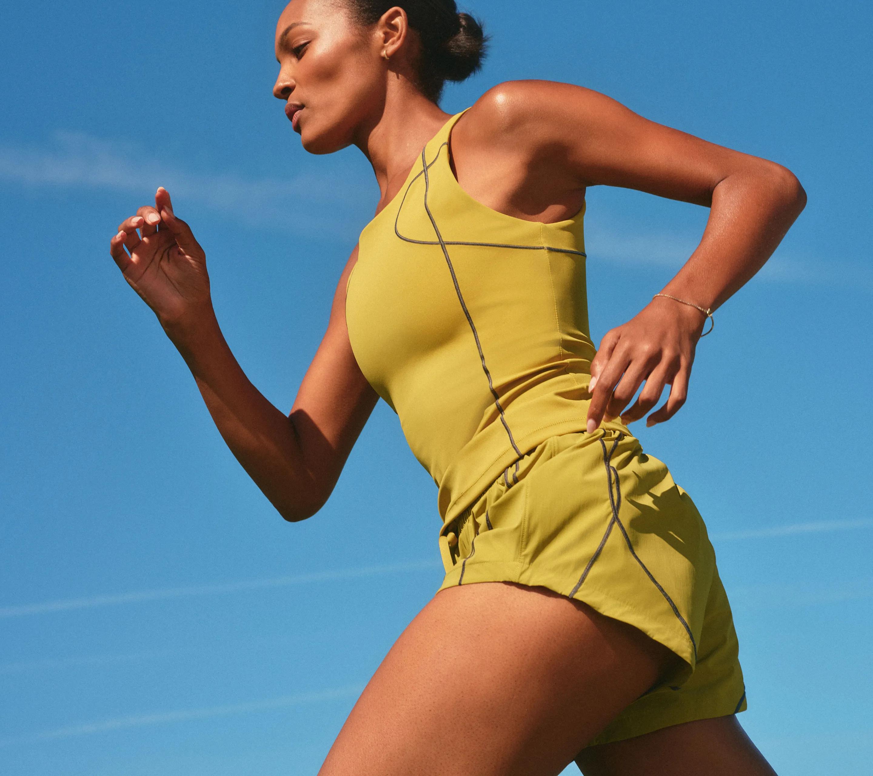 model running in spanx runclub set